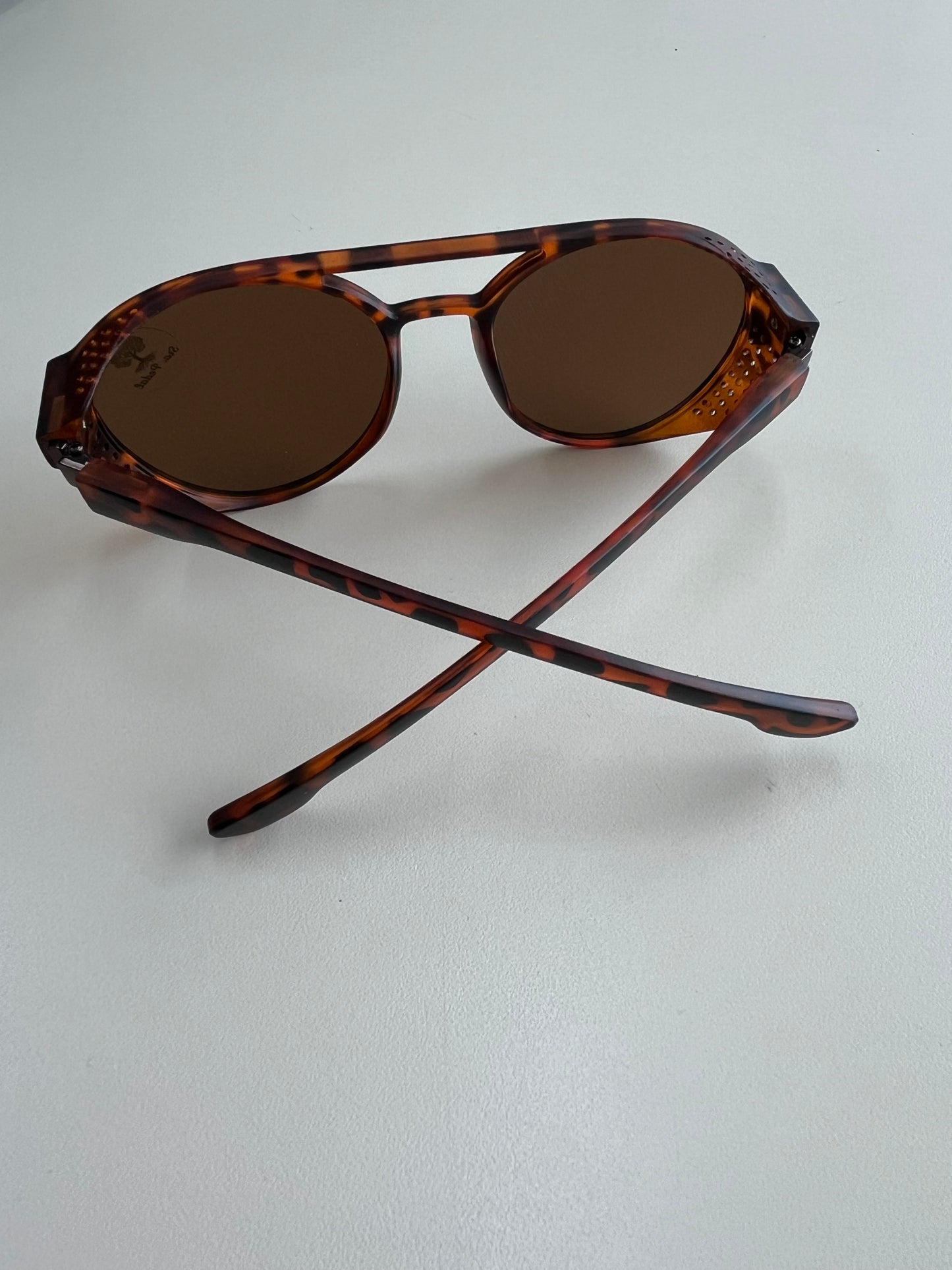 Modelo Alok redondo unissex