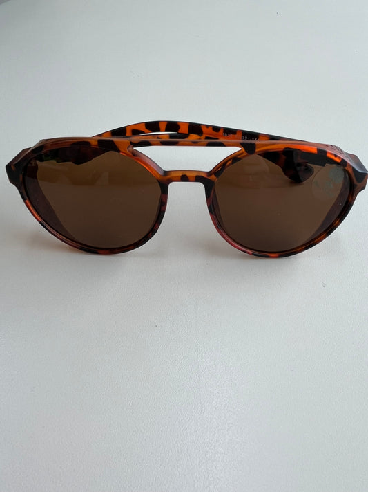 Modelo Alok  redondo unissex